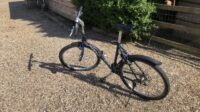 Mountainbike in goede staat met helm